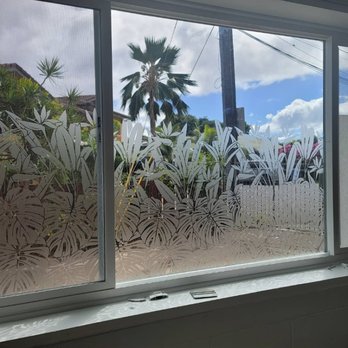 Tinting Hawaii - Monstera with birds of paradise graphics. The left window I installed True Vue 30 over the image. - Home Window Tinting Near Me - Honolulu, Hawaii Tinting Hawaii - Monstera with birds of paradise graphics. The left window I installed True Vue 30 over the image. - Home Window Tinting Near Me - Honolulu, Hawaii