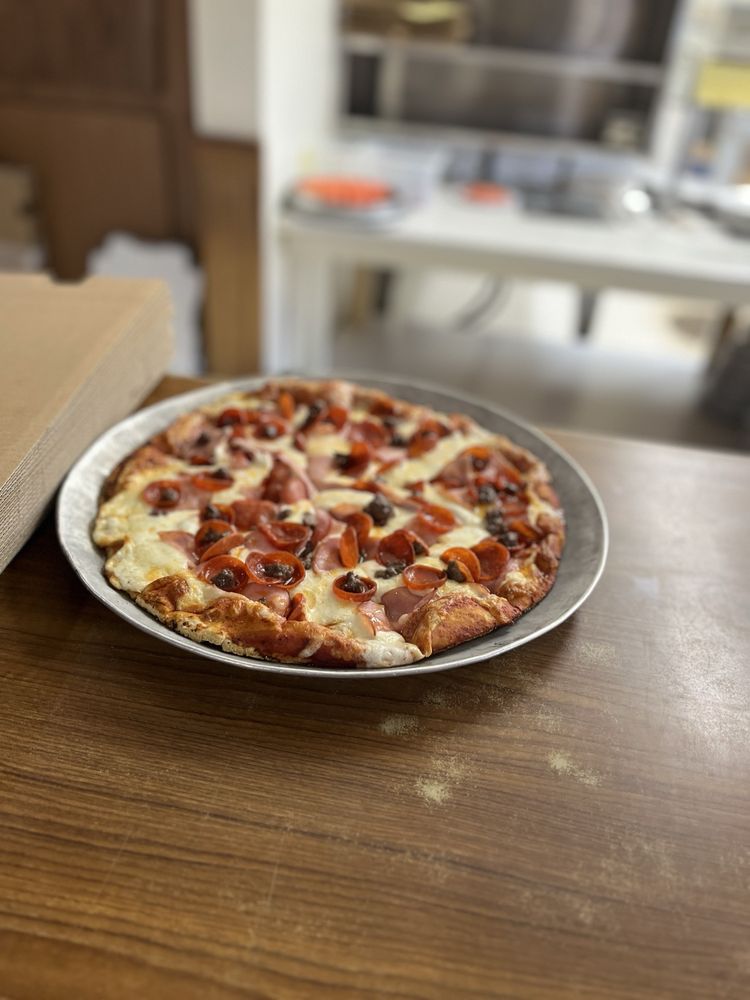 The Original Padington’s Pizza Logo