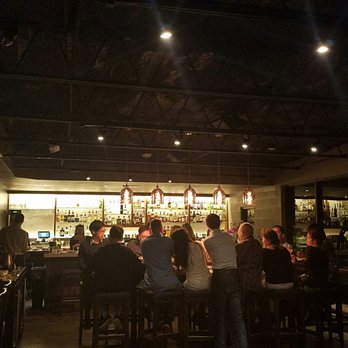 Riel - Bar area, community table - New American Near Me - Houston, Texas Riel - Bar area, community table - New American Near Me - Houston, Texas