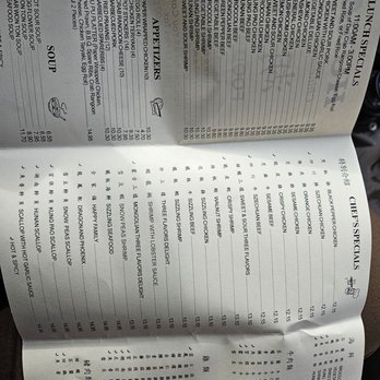 Hunan Chinese Restaurant - a person reading a menu - Chinese Near Me - Gardnerville, Nevada Hunan Chinese Restaurant - a person reading a menu - Chinese Near Me - Gardnerville, Nevada