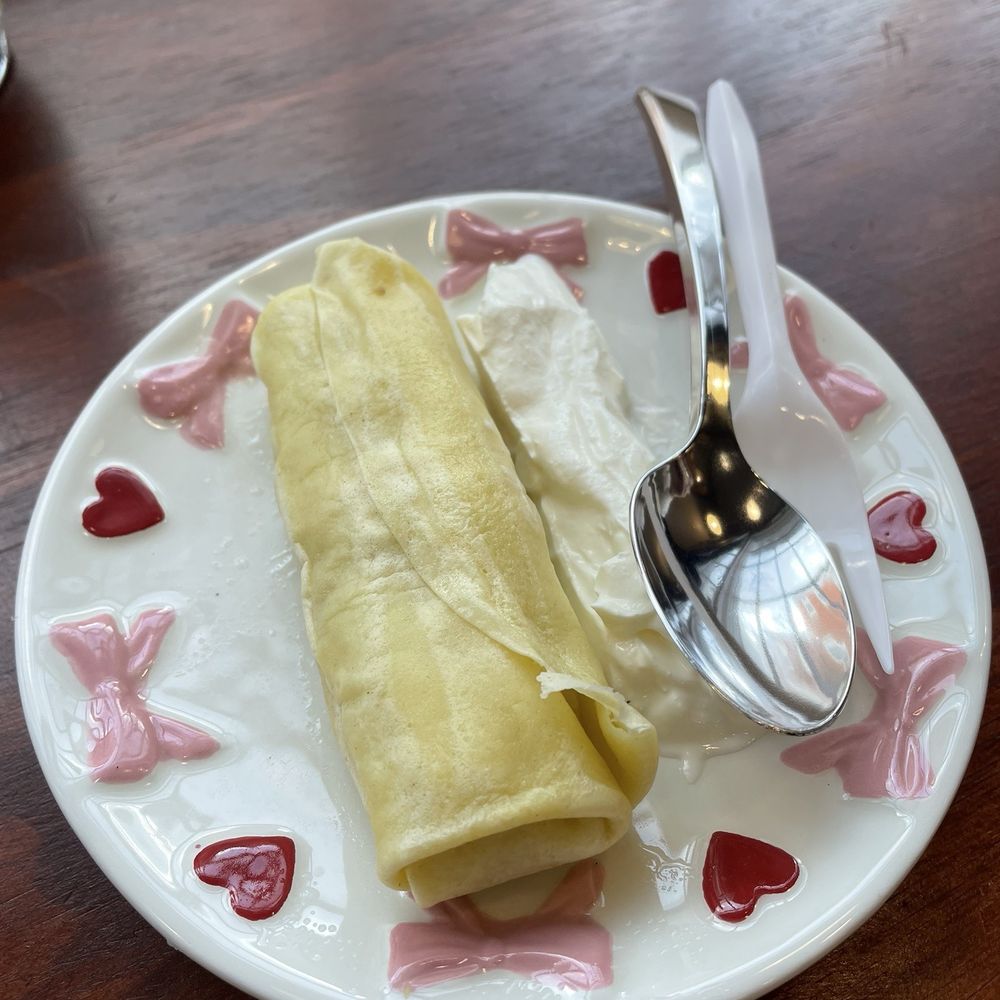 Meat crepe with sour cream on the side