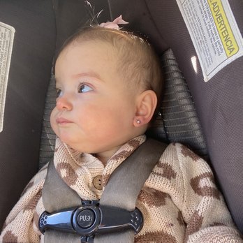 Claire's - 9 month old with new ear piercing from Claire's at ridge walk - Accessories Near Me - Woodstock, Georgia Claire's - 9 month old with new ear piercing from Claire's at ridge walk - Accessories Near Me - Woodstock, Georgia