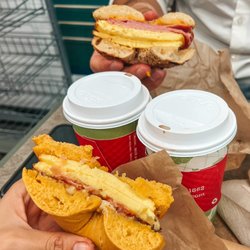 Deland Bagel - Egg, Bacon & Cheese in an Egg Bagel, Jersey Pork Roll on an Everything bagel with 2 vanilla lattes.