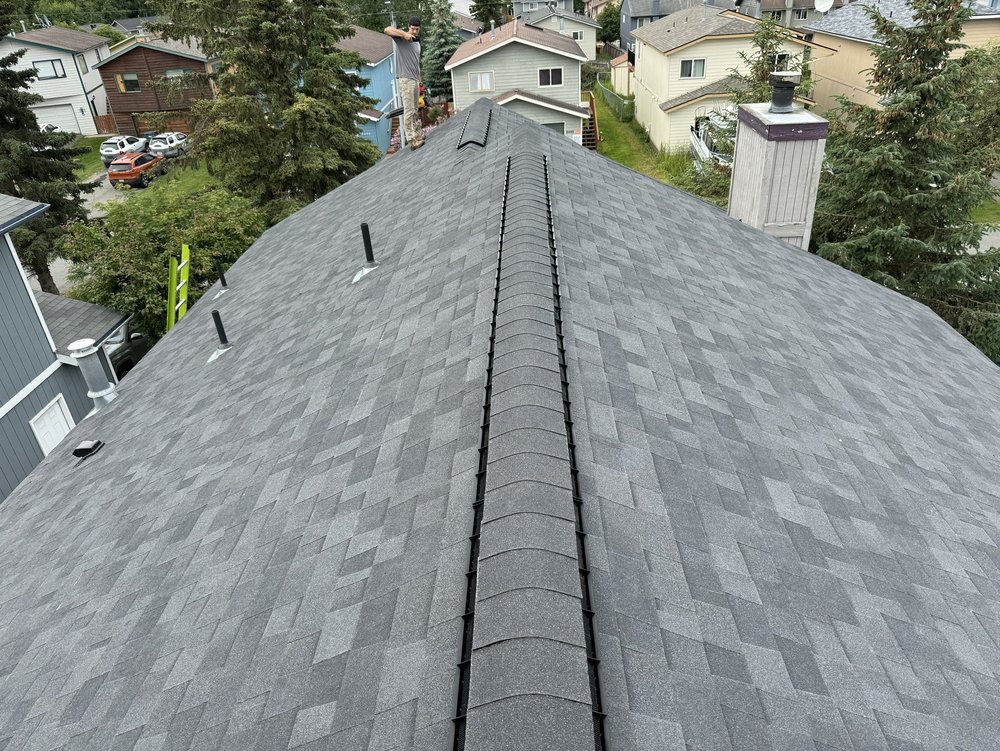 Slide of Harris Roofing