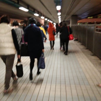 港鐵紅磡站 - the bridge that leads the flock of tired workers towards the station - Train Stations Near Me - Hong Kong, HK