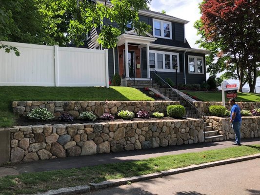 Retaining Walls - We are fully licensed with an unrestricted Contractor Supervisor License (CSL) and a Home Improvement License. With extensive experience in the field, we've constructed hundreds of retaining walls using blocks from leading brands such as Techo-Bloc, Unilock, Ideal Pavers, Belgard, Nicolock, and Cambridge. Our capabilities extend to building walls from concrete with stone veneer caps, as well as creating structures from authentic natural fieldstone or any type of natural stone.