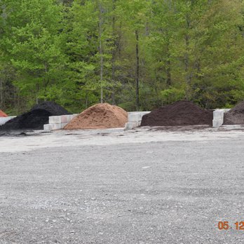 Robinson Contracting & Landscaping - a pile of dirt in a parking lot - General Contractors Near Me - Milan, Pennsylvania Robinson Contracting & Landscaping - a pile of dirt in a parking lot - General Contractors Near Me - Milan, Pennsylvania