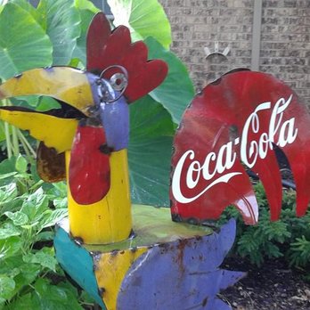 Hawaiian Landscape Services - a colorful rooster with a coca cola sign - Landscaping Near Me - Wylie, Texas