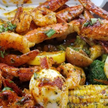 Chef Oya's The Trap - Legs and shrimp spicy loaded plate - American Near Me - Indianapolis, Indiana Chef Oya's The Trap - Legs and shrimp spicy loaded plate - American Near Me - Indianapolis, Indiana