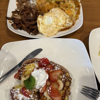 Loaded Cafe - Asada Chilaquiles Plate & Strawberry Banana Brioche French Toast - Breakfast & Brunch Near Me - Santa Ana, California Loaded Cafe - Asada Chilaquiles Plate & Strawberry Banana Brioche French Toast - Breakfast & Brunch Near Me - Santa Ana, California
