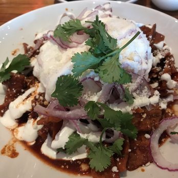 Rustic Root - Chilaquiles with poached eggs - Cocktail Bars Near Me - San Diego, California Rustic Root - Chilaquiles with poached eggs - Cocktail Bars Near Me - San Diego, California