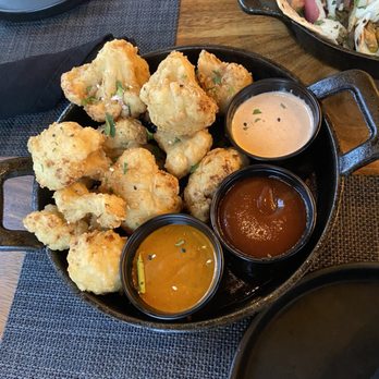 Stateside Tap + Tavern - Crispy cauliflower nibs (Cajun honey) - New American Near Me - Somerset, New Jersey Stateside Tap + Tavern - Crispy cauliflower nibs (Cajun honey) - New American Near Me - Somerset, New Jersey