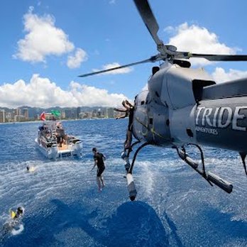 Trident Adventures - Just one of many helicopter GoPro angles. Safety divers are visible ready to pounce, with dive boat standing by for more fun. - Dive Shops Near Me - Honolulu, Hawaii Trident Adventures - Just one of many helicopter GoPro angles. Safety divers are visible ready to pounce, with dive boat standing by for more fun. - Dive Shops Near Me - Honolulu, Hawaii