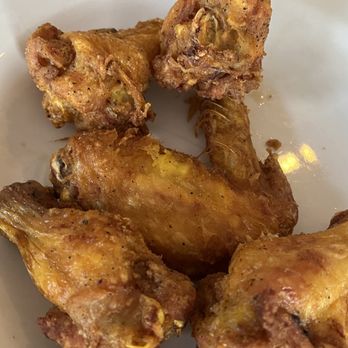 Thai Fusion - fried chicken wings on a white plate - Thai Near Me - Brooklyn Park, Minnesota Thai Fusion - fried chicken wings on a white plate - Thai Near Me - Brooklyn Park, Minnesota