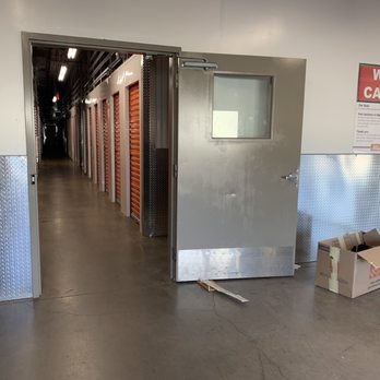 Public Storage - Phoenix - Security door propped open with trash - Self Storage Near Me - Phoenix, Arizona