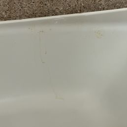 Disgusting look bottom right of tub Disgusting look bottom right of tub