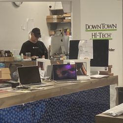 Downtown Hi-Tech - My stolen laptop there on the counter