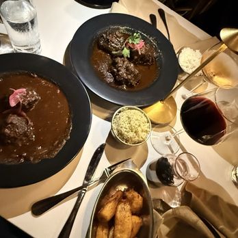 Spicy Mango - Red Beans Oxtail, Braised Oxtail, Plantains, Merlot wine, and Rose - Caribbean Near Me - New Orleans, Louisiana