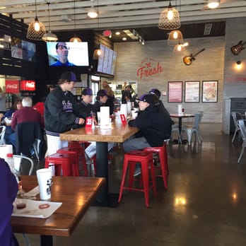 Slim Chickens - Dining area - cool decor - Chicken Wings Near Me - Overland Park, Kansas Slim Chickens - Dining area - cool decor - Chicken Wings Near Me - Overland Park, Kansas