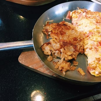 Waverly Diner - Tomato and feta omelette in a frying pan. - Diners Near Me - New York, New York Waverly Diner - Tomato and feta omelette in a frying pan. - Diners Near Me - New York, New York