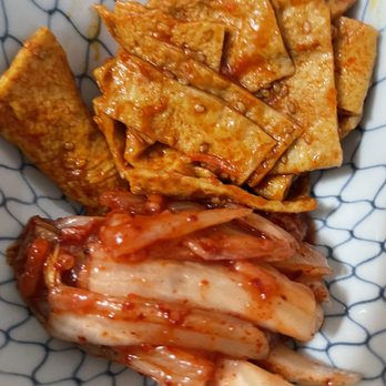 Yuk Dae Jang - Gardena - Banchan (side dishes) of kimchi and fish cakes. Yum! #makesmewander - Korean Near Me - Gardena, California Yuk Dae Jang - Gardena - Banchan (side dishes) of kimchi and fish cakes. Yum! #makesmewander - Korean Near Me - Gardena, California