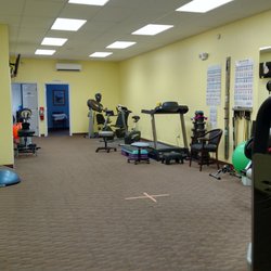 Oak View Physical Therapy - Large gym area with four private treatment rooms.