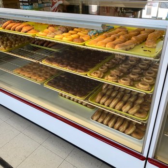 Donut Palace - a variety of donuts in a display case - Donuts Near Me - Marshall, Texas