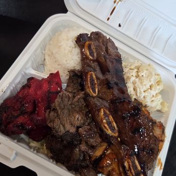 Pacific Rim and Sushi - Super combo plate with kalbi ribs, spicy garlic chicken, BBQ beef and char siu with rice and mac salad. - Poke Near Me - Mesa, Arizona Pacific Rim and Sushi - Super combo plate with kalbi ribs, spicy garlic chicken, BBQ beef and char siu with rice and mac salad. - Poke Near Me - Mesa, Arizona