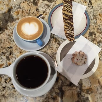 Melk - Cappuccino and coffee with a biscotti and a small cookie. All delicious! - Coffee & Tea Near Me - Montreal, Quebec