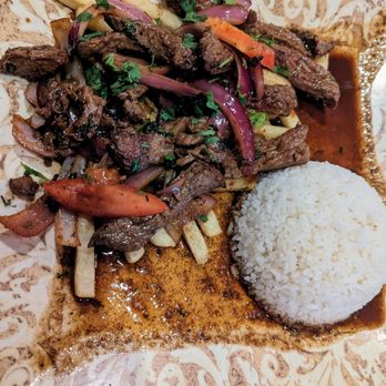 Happy Fish - Lomo Saltado $18 - Peruvian Near Me - Tampa, Florida Happy Fish - Lomo Saltado $18 - Peruvian Near Me - Tampa, Florida