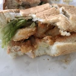 Bon Temps Poboys - Partially eaten delicious shrimp Poboy.