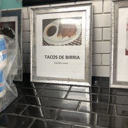 Guerrero's Market - Closer look of what dishes are offered. A pack of toilet paper (lol) was blocking that they also offer carne asada.