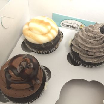The Sweet City Cupcakes - Salted Caramel and Cookies and Cream and I don't know the chocolate one's name but doesn't it look amazing? - Cupcakes Near Me - Saint Augustine, Florida The Sweet City Cupcakes - Salted Caramel and Cookies and Cream and I don't know the chocolate one's name but doesn't it look amazing? - Cupcakes Near Me - Saint Augustine, Florida