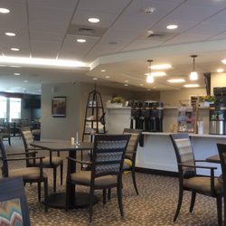 Hesston Bakery & Cafe - General overview. Order at counter just out of sight roughly through middle of the photo. This view has drinks stations.