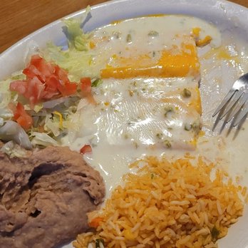 La Cantera - Cheese enchiladas with queso on top. - Mexican Near Me - Pleasanton, Texas