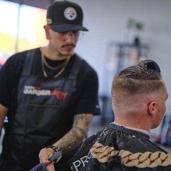 Diamond Blade Barber Studio - Alex checking his work - Barbers Near Me - Roseville, California Diamond Blade Barber Studio - Alex checking his work - Barbers Near Me - Roseville, California