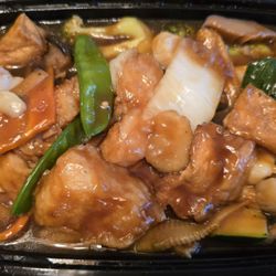 Braised Seafood Casserole ($20.95), with white rice packed separately.