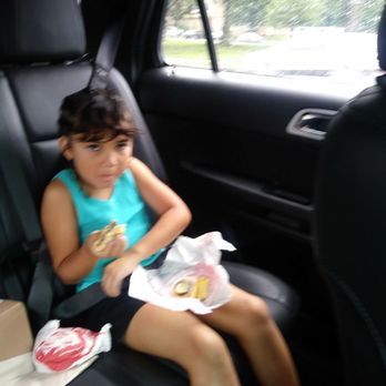 Wendy's - a young girl sitting in the back seat of a car - Burgers Near Me - Philadelphia, Pennsylvania Wendy's - a young girl sitting in the back seat of a car - Burgers Near Me - Philadelphia, Pennsylvania