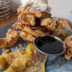 Early Girl Eatery - West Asheville - Bow to the King. $15.95. Fried chicken tenders, cinnamon-battered buttermilk biscuits, house whipped cream, powdered sugar, seasonal fruit.