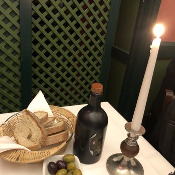 Gallo Nero - Complementary bread and olives. Bread is very hard. Butter has water inside. - Italian Near Me - Frankfurt, HE