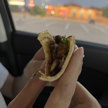 Crazy Tasty Tacos - a hand holding a taco - Tacos Near Me - Plano, Texas Crazy Tasty Tacos - a hand holding a taco - Tacos Near Me - Plano, Texas