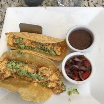 Nido Cafe - breakfast tacos // taste fine but on oily side because of the chorizo - Coffee & Tea Near Me - Cumming, Georgia