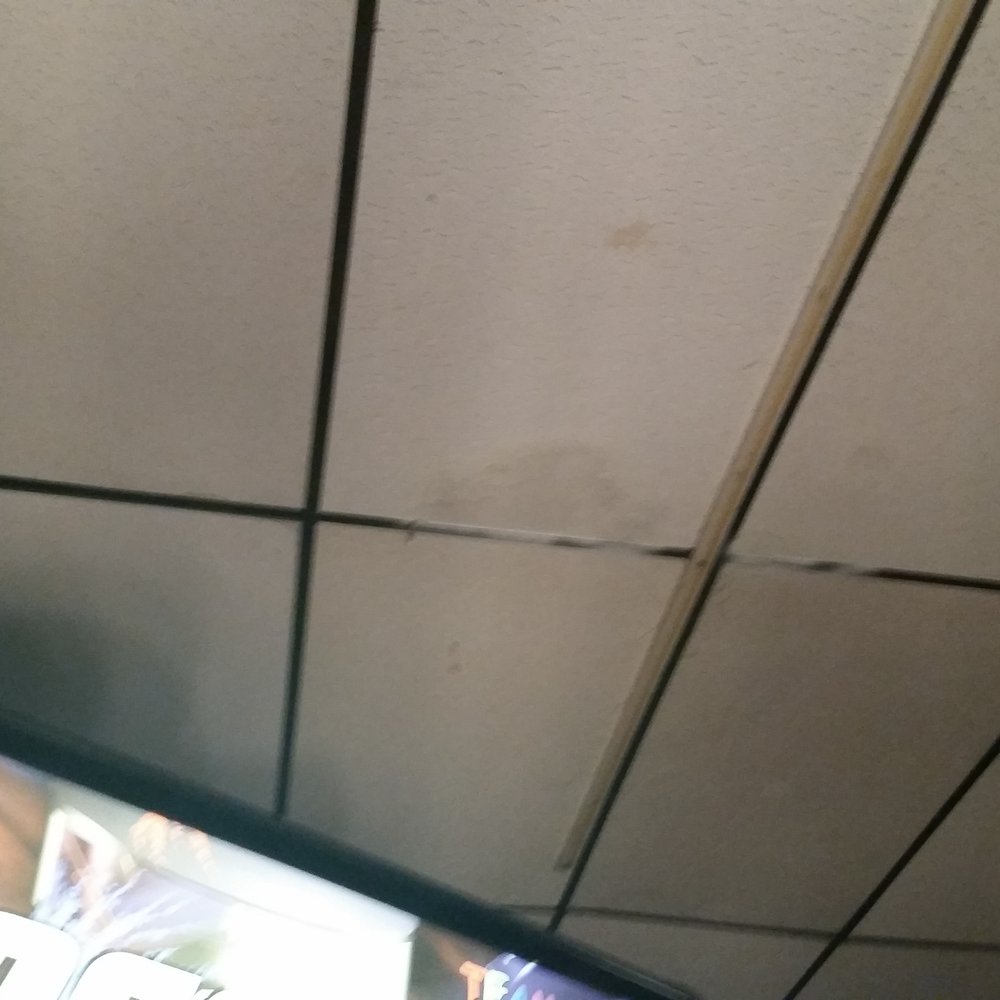 Fun World - Painted ceiling tiles to conceal water damage - Amusement Parks Near Me - Nashua, New Hampshire