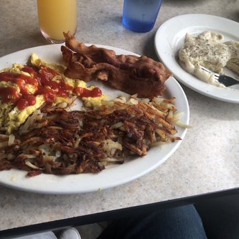 Cobian's Restaurants - Scrambled eggs (w/ketchup added) hash browns, bacon, and side of biscuits and gravy. - Mexican Near Me - Cypress, California Cobian's Restaurants - Scrambled eggs (w/ketchup added) hash browns, bacon, and side of biscuits and gravy. - Mexican Near Me - Cypress, California