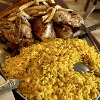 Portuguese Churrasqueira BBQ Restaurant - Chicken & Spare Ribs comes with two sides: French Fries and Rice - Portuguese Near Me - Spring Valley, New York Portuguese Churrasqueira BBQ Restaurant - Chicken & Spare Ribs comes with two sides: French Fries and Rice - Portuguese Near Me - Spring Valley, New York