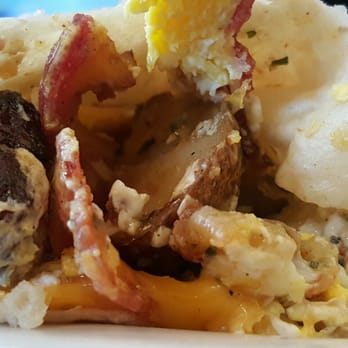 Cafe Zocalo - Inside a breakfast burrito sausages are juicy and sweet - Bakeries Near Me - Orange, California