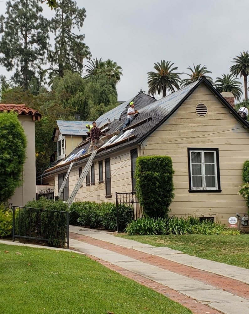 Slide of P&M Roofing