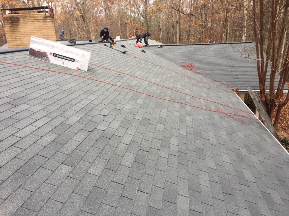 Slide of Rainblocker Roofing & Construction