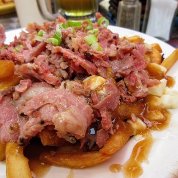 La Baraque du Vieux St-Vincent - Montreal poutine. French fries, smoked meat, cheese curds and gravy. $12.99. - Pizza Near Me - Montreal, Quebec