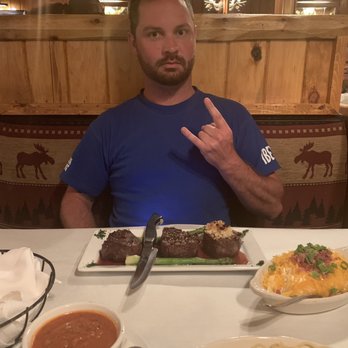 Timber Lodge - He's being a goof. Our sides of spaghetti and mashed potatoes! - Steakhouses Near Me - Medina, Ohio